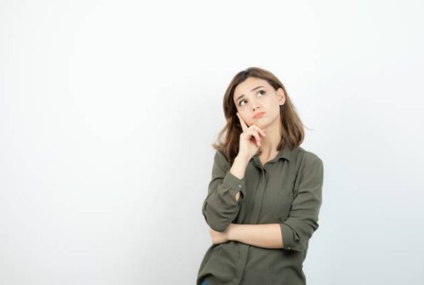 adorable young woman casual outfit standing thinking high quality photo (1)